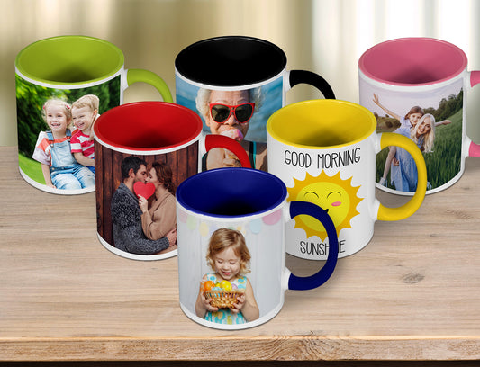 Line-up of colourful coffee mugs, all with different handle and inside colour.