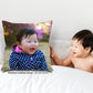 Kid laughing at seeing his own photo on cushion cover